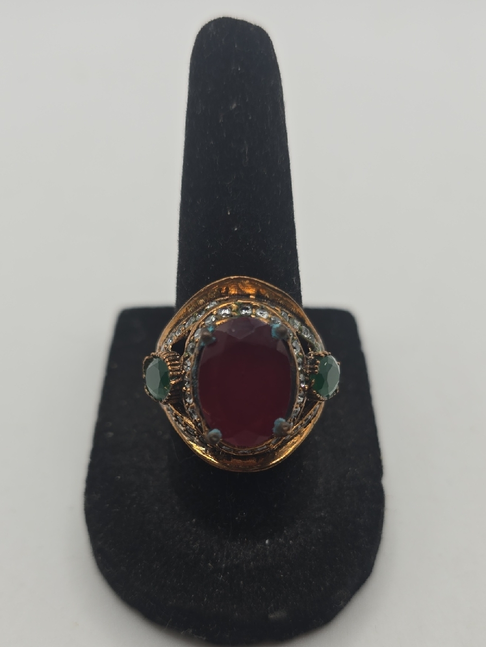 Sterling Silver Gold Tone Red Stone Cocktail Ring with Green Accents